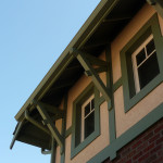 Eave of roof showing a series of wood corbels